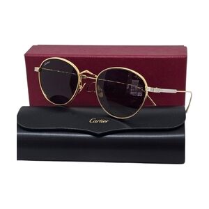 Cartier Gold sunglasses with brown lenses